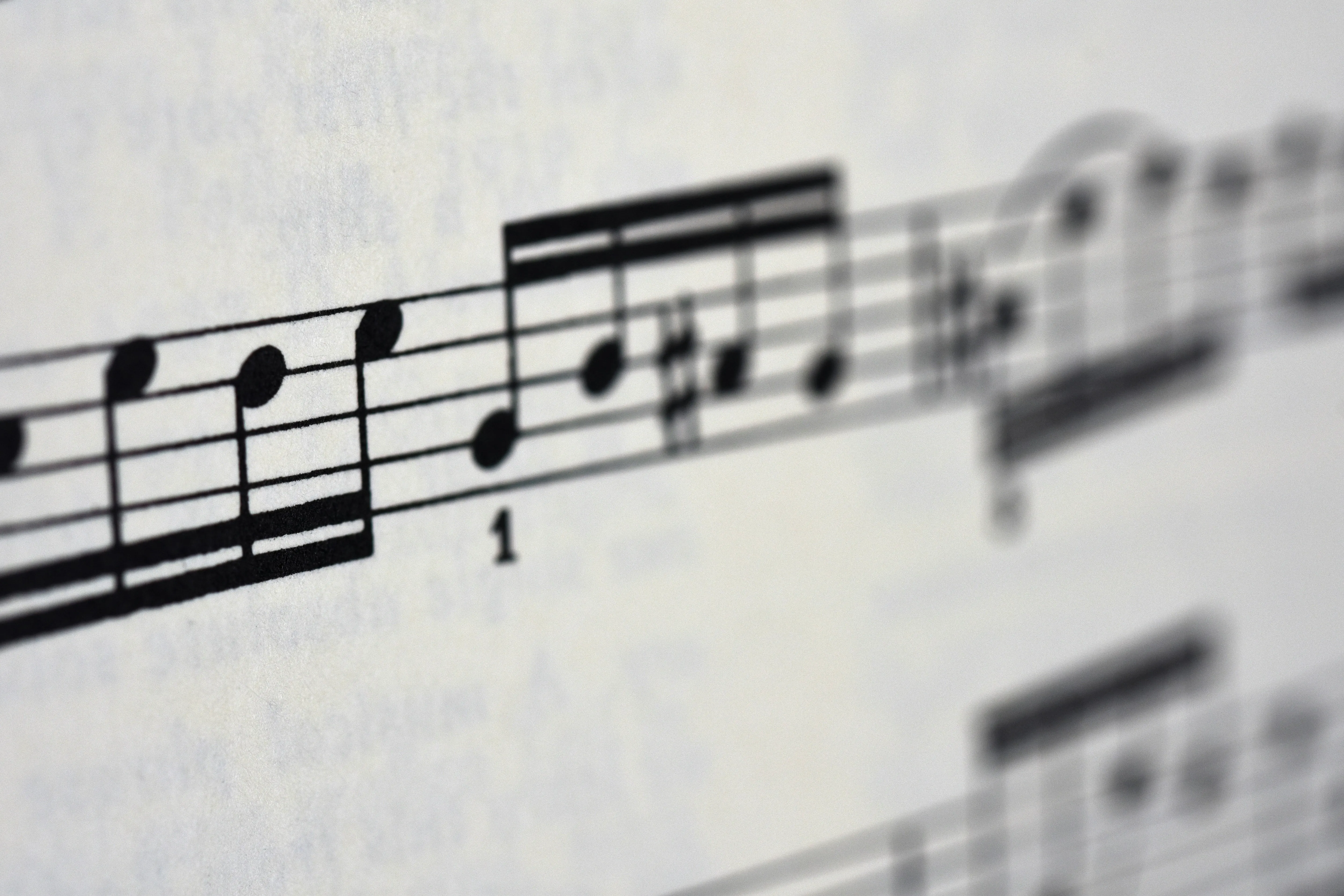 Scoring is the craft of adapting or composing a musical idea for a specific performance, ensemble, or style. It bridges creativity and structure by deciding how parts are distributed, harmonies built, and textures created.